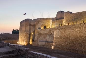 Sunset at the recontructed Bahrain Fort near Manama at Seef, Bahrain