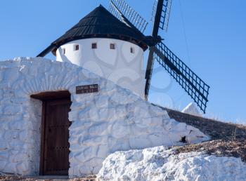 Cave house or storage under historic windmills on plain above Campo de Criptana in Castilla-La Mancha, Spain