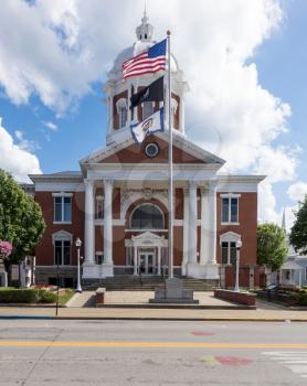 Flags fly in front of the Upshur County Court House in Buckhannon West Virginia