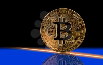 Single bit coin or bitcoin with reflection on black and blue background to illustrate blockchain and cyber currency