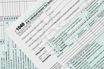 Close macro photo of USA IRS tax form 1040 for year 2017 taken from above