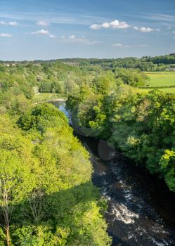 View of River Dee from top of old Pontcysyllte Aqueduct near Chirk carrying Llangollen Canal across river Dee