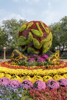 Flowers by the Bell and Drum towers in Beijing with floral display for National holiday