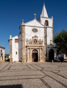 Main entrance into the Igreja de Santa Maria in the old medieval walled city of Obidos in Portugal