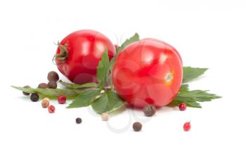 red tomatoes,basil and pepper on white background