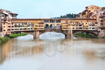 View of the Arno river and Bridge Ponte Vecchio. Florence, Italy.