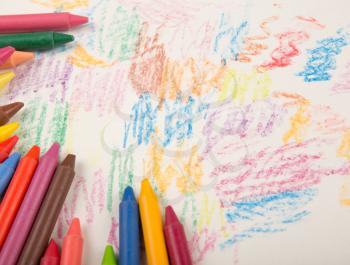 Crayons on the wooden desk