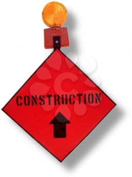 Royalty Free Photo of a Construction Sign with a Light