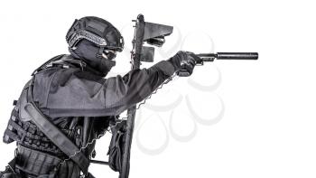 Police special operations and counter-terrorism team, SWAT officer in black uniform, mask and helmet, hiding behind ballistic shield and aiming with pistol, studio shoot, isolated on white background