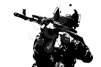 Hard light image of spec ops soldier in face mask with his rifle