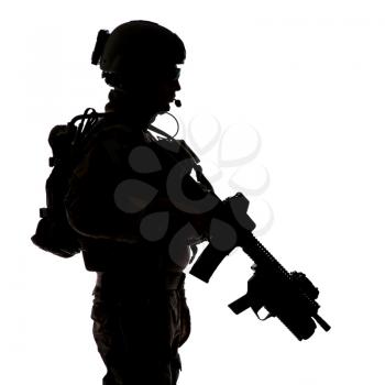 Silhouette of United States Army ranger with assault rifle