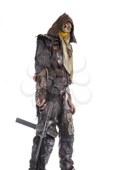 Nuclear post apocalypse life after doomsday concept. Grimy survivor with homemade weapons. Studio closeup portrait on white background