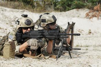 Members of US Army Rangers machinegun crew during the fight in the desert