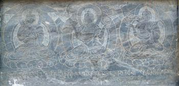 The buddhistic pictures engraved on the stone