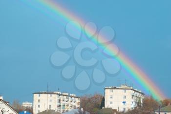 Beautiful colorful rainbow in the blue sky