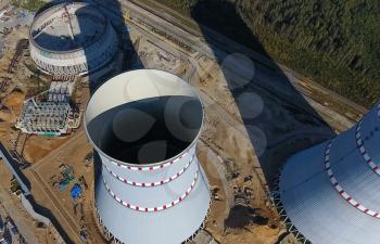 Aerial survey of a nuclear power plant under construction. Installation and construction of a power plant. Nuclear power.