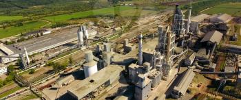 Panorama of the cement plant. Large cement plant. The production of cement on an industrial scale in the factory.