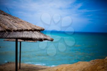 Focused Sun Lid Over Beautiful Coastline with a Gorgeussea water background. Breezy  Sunny day of the summer.