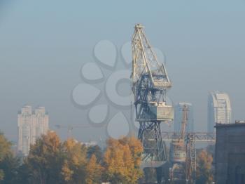 Port cranes for cargo transportation in the port logistics complex