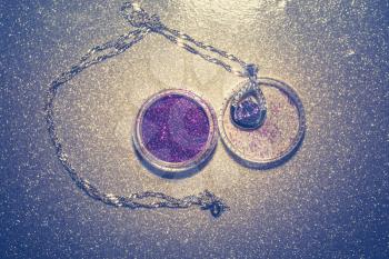 Fashion silver pendant with purple zirconia, amethyst imitation, filtered.