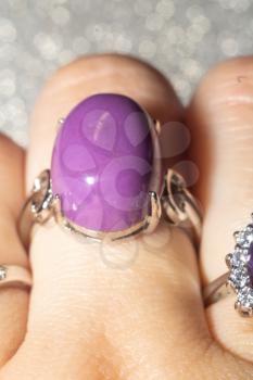 Fashion silver ring with big violet phosphosiderite stone.