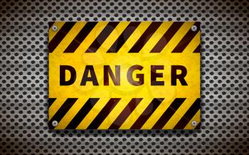 Bright yellow danger plate on metallic grid, industrial background