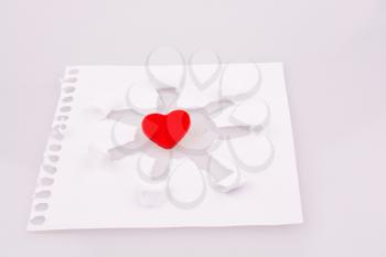 Paper art with a heart in the middle