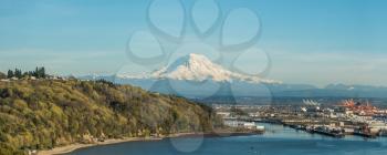 A panoramic view of majestic Mount Rainier towering over the Port of Tacoma.