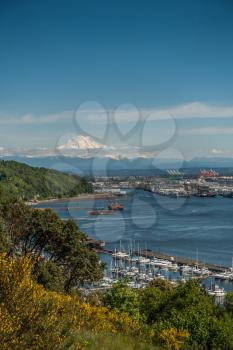 Majestic Mount Rainier rises up over the Port of Tacoma in Washington State.