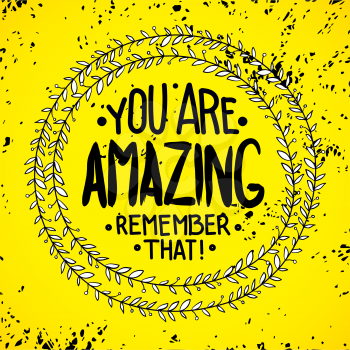 You are  amazing. remember that. Inspirational quotes written in a wreath by hand, for writing on posters, T-shirts and cards. Vector calligraphy, isolated on white background