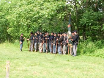 american civil war reenactment soldiers fight in field