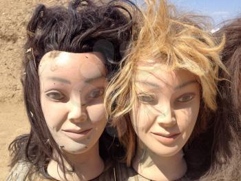 Female mannequin plastic fake toy heads with hair outdoor