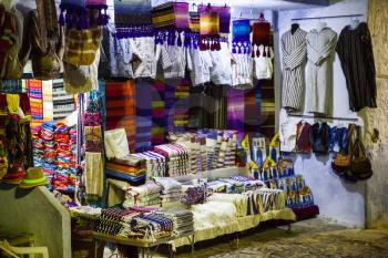 Colorful traditional moroccan fabrics on street market in Chefchaouen