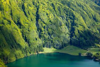 Closeup view of the crater walls covered with forest, Lagoa das Sete Cidades