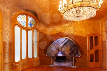 Barcelona, Spain - 30 July 2020: Casa Batllo entrance fireplace