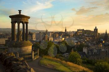 View of Edinburgh city and Scott monument during sunset hour from Carlton Hill