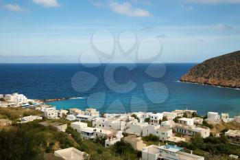 Beautiful Appolonia village and his white houses and turquoise ocean in Naxos island in Greece