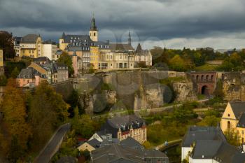 Beautiful view on the medieval village in Luxembourg with a dark grey sky in background