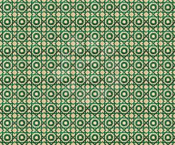 Collage of green pattern tiles in Lisbon, Portugal repeated to create a seamless, tillable pattern.