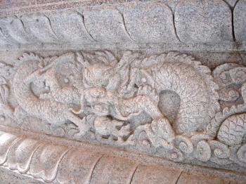 Royalty Free Photo of a Stone Dragon Carving
