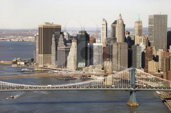 Royalty Free Photo of an Aerial view of New York City's Manhattan Bridge with Brooklyn Bridge and Manhattan Buildings