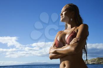 Royalty Free Photo of a Young Woman in a Bikini on a Beach in Maui Hawaii