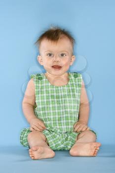 Royalty Free Photo of a Little Boy Sitting