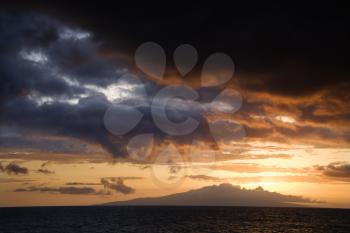 Royalty Free Photo of Sunset Over Pacific Ocean and Kihea Island in Maui, Hawaii, USA