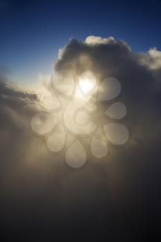 Royalty Free Photo of Clouds With Sun Shining Through