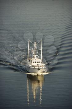 Royalty Free Photo of an Aerial View of a Trawler Fishing Boat at Sea