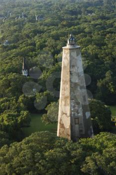 Royalty Free Photo of an Aerial View of Old Baldy Lighthouse in a Wooded Park at Bald Head Island, North Carolina