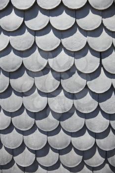Royalty Free Photo of a Close-up of a Rooftop With Scale Shaped Shingles in Lisbon, Portugal