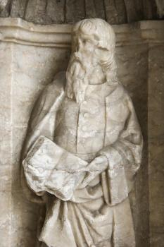 Royalty Free Photo of a Sculpture of a Man on Exterior of Mosteiro dos Jeronimos in Lisbon, Portugal
