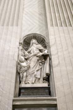 Royalty Free Photo of a Saint Teresa Statue Inside St. Peter's Basilica in Rome, Italy